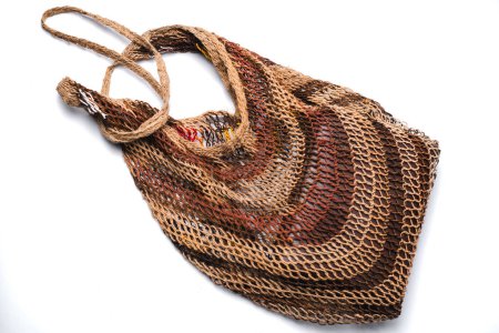 Noken. Noken is a traditional bag from the Papuan Mountains, Indonesia, which is made from tree bark fiber