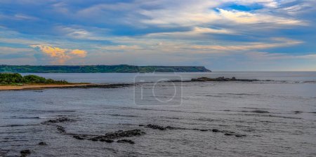 Photo for Magnificent bay, beautiful  vast peninsula view and scenic sky cape, pleasant cloudscape. Xiyu, Penghu, Taiwan,For branding,calender,postcard,screensave,wallpaper,poster,banner,cover,website.High quality photo - Royalty Free Image