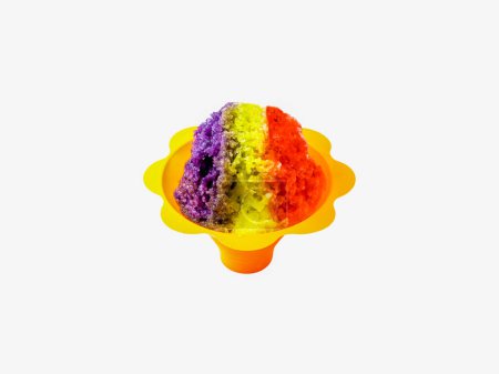 Photo for Rainbow Hawaiian Shave ice, shaved ice or snow cone dessert on a white background with copy space. - Royalty Free Image