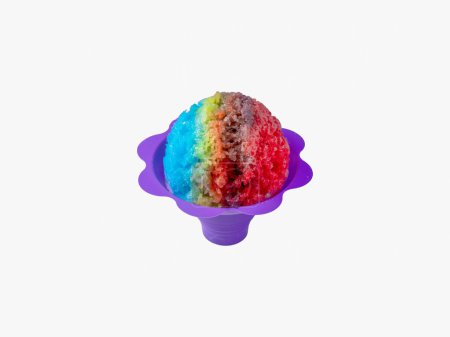 Rainbow Hawaiian Shave ice, shaved ice or snow cone dessert on a white background with copy space.