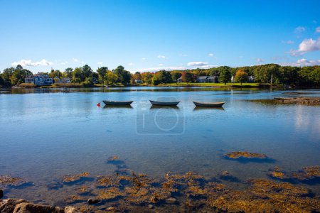 Photo for Three boats in the cove at Kennebunkport Maine. - Royalty Free Image