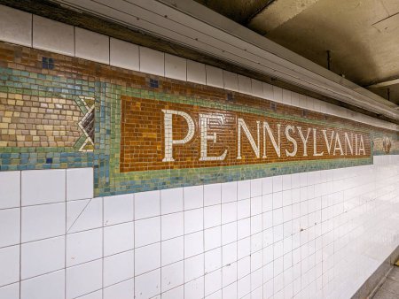 Mosaic subway sign for Penn Station in New York