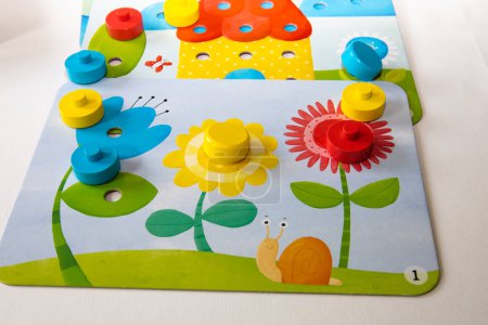 Photo for Children's toys. Educational games mosaic. Logic game for kids. Early development concept. Happy child and fun Games. Colourful wooden blocks. - Royalty Free Image