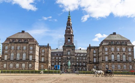 Photo for Copenhagen, Denmark - September 8, 2023. Christiansborg, Danish Parliament building and a cart with a horse. Danish Parliament Folketinget. - Royalty Free Image