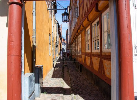  Houses in the aincient town of Elsinore - Helsingor, Denmark. Very narrow street in the old town. Popular tourist place.