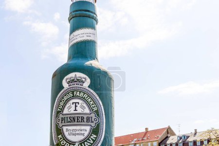 Photo for Big green bottle of Tuborg beer monument in Copenhagen, Denmark - June 1, 2023. - Royalty Free Image