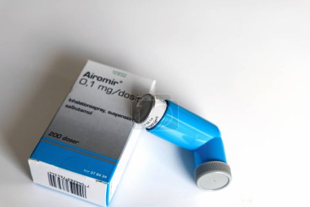 Photo for Medicine for asthmatics. Blue inhaler Airomir. Denmark - March 24, 2024 - Royalty Free Image