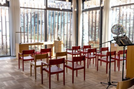 Church room for prayer and privacy with a large cross and chairs for visitors. Herlev hospital, Denmark.