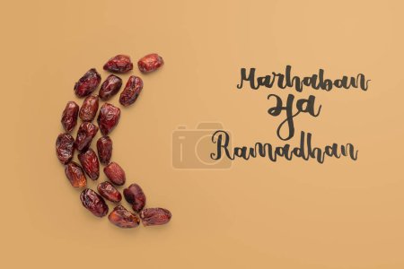 Photo for Dates fruits  with marhaban ya ramadhan text - Royalty Free Image