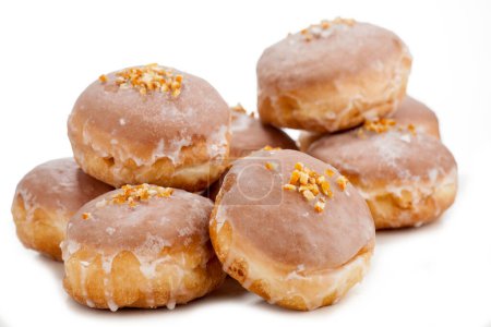 Photo for Freshly fried glazed donuts with various fillings. Sweetness for Fat Thursday - Royalty Free Image