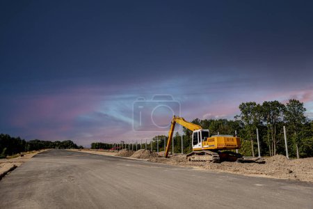 Photo for Road building. Highway construction and machines used for construction. Excavator, bulldozer, roller - Royalty Free Image