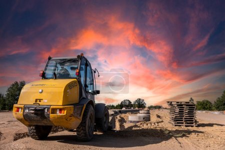 Photo for Highway construction. The process of building a highway. Equipment tools and machines used in road construction - Royalty Free Image