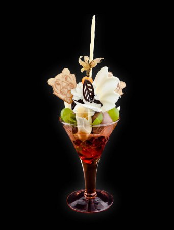 Photo for Ice cream desserts with seasonal fruit in a glass cup - Royalty Free Image