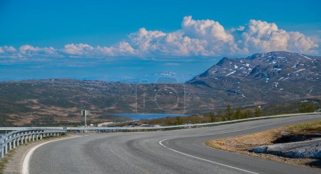 Photo for Asphalt road high in the tundra mountains - Royalty Free Image