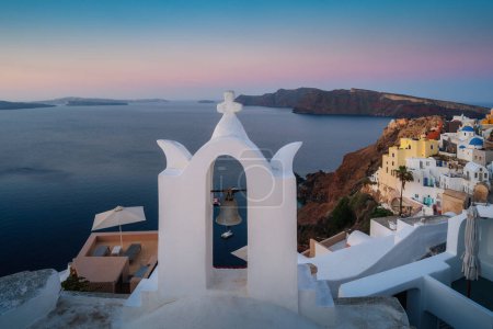 Photo for Paradise found in Santorini! This iconic image showcases the island's stunning blue domes, white houses, rugged caldera, and endless sea. - Royalty Free Image