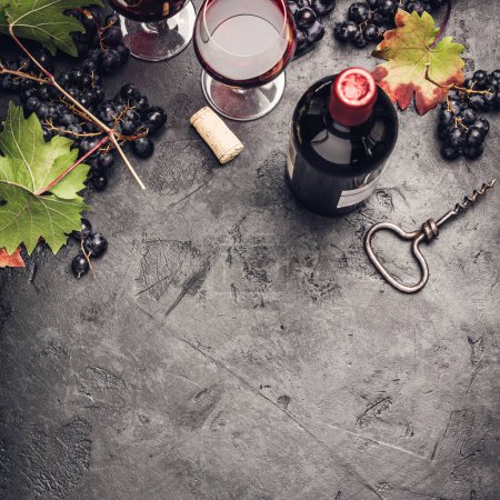 Photo for Wine with grapes, leaves and corks on dark background, copyspace, flat lay - Royalty Free Image