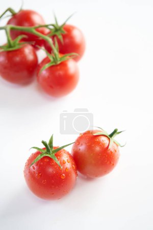 Mini Tomato fruit on white background    