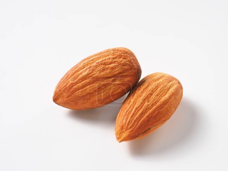 Almond fruit on white background