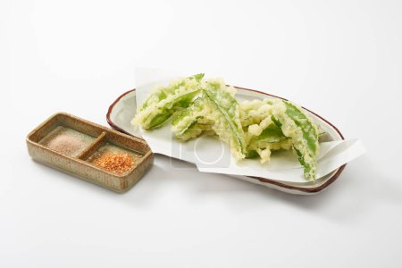  Beflügelte Bohnen tempura. Tempura ist eine japanische Kochmethode, die ein frittiertes Essen ähnlich Krapfen ist.                              