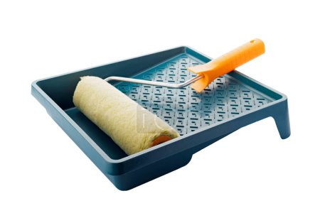 Isolated image of a paint roller and tray on a white background, ready for home improvement and DIY projects.