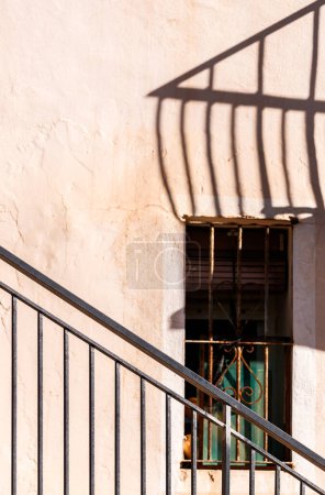 Photo for Shadows of the bars in the old town of Villajoyosa - Royalty Free Image