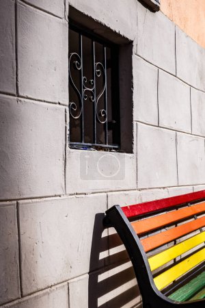 Photo for LGBTIQ+ bench with window in the old town of Villajoyosa - Royalty Free Image