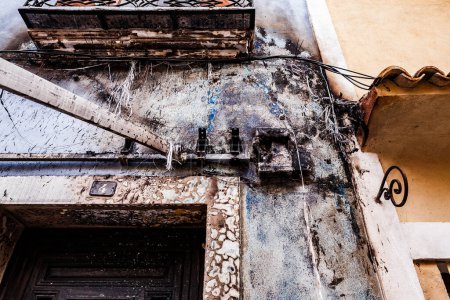 Photo for Facade and burned cables in the old town of Villajoyosa - Royalty Free Image