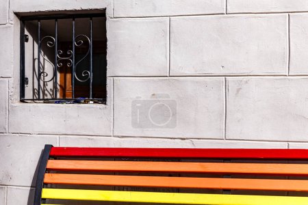 Photo for Homosexual bench with window in the background - Royalty Free Image