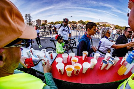 Photo for Villajoyosa, Alicante, Spain. 11-27-2022: Cyclists at the bike day in Villajoyosa - Royalty Free Image