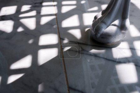 Photo for Leg of a chair with shadows in Villajoyosa - Royalty Free Image