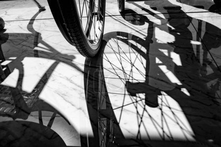 Photo for Rear view of a wheelchair with shadows in Villajoyosa - Royalty Free Image