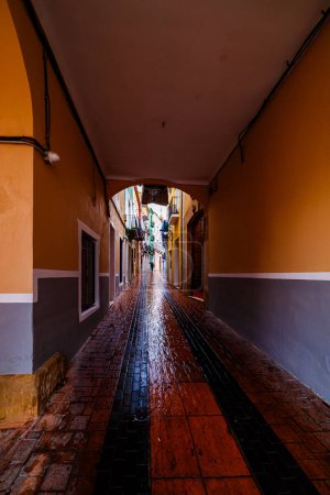 Photo for Arch in Villajoyosa's main street during the storm - Royalty Free Image
