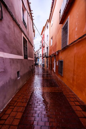 Photo for Maria Amada Street in the rain in Villajoyosa - Royalty Free Image
