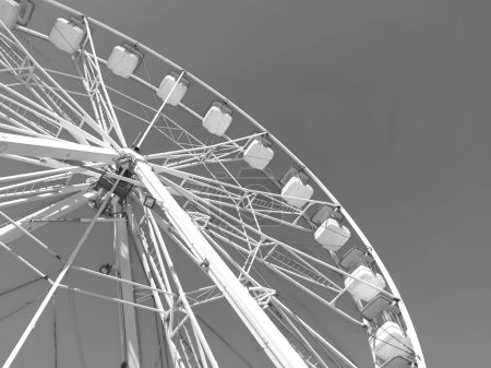 Photo for Huge white ferris wheel with grey sky - Royalty Free Image