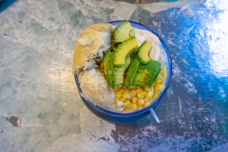 Mixed ice is one of the refreshing drinks that cannot be refused in hot weather, this dessert is called es teler with toppings of durian, corn, avocado and slice of coconut.