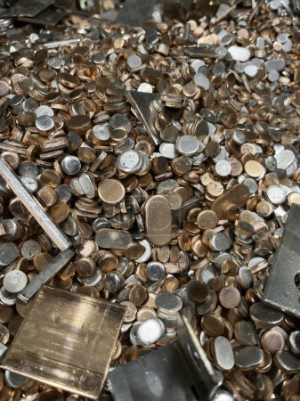 Photo for Copper punching's some with tin coating ready to be recycled. High quality photo - Royalty Free Image