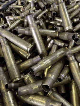 Spent brass bullet cases ready to be recycled. High quality photo
