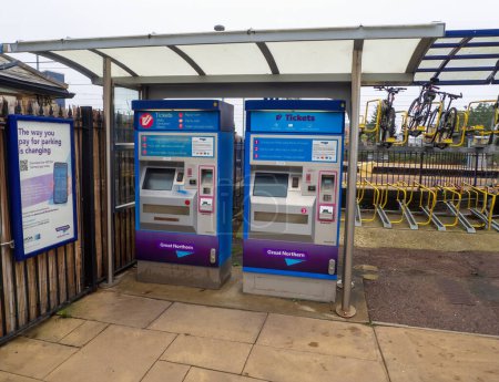 Photo for St Neots, UK - Saturday 21st October 2023: Automatic ticket machines at St Neots train station and bicycle racks. High quality photo - Royalty Free Image