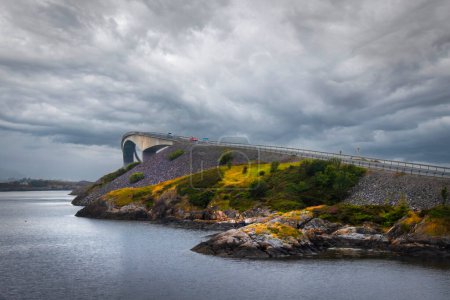 Storseisunbrau bridge with a dramatic sky showing the curve at the top of the bridge. High quality photo