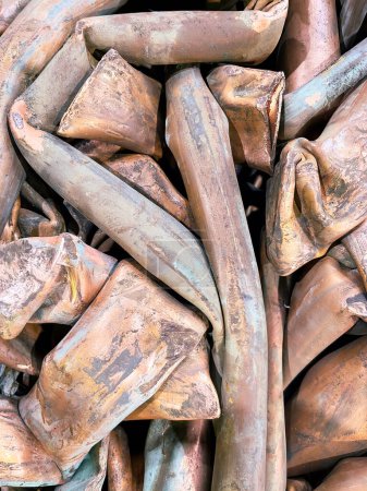 Crushed copper tubes in a recycling centre. High quality photo