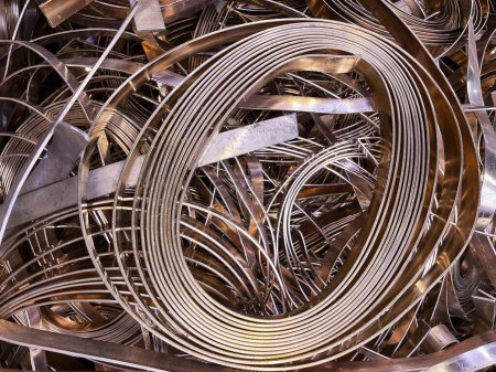 Photo for Copper scrap electro strip some in coils, often used for electric current transfer. Landscape view. High quality photo - Royalty Free Image