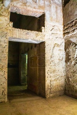 Photo for Rome, Italy - 14th February 2016: Brick arch and roman paintings in Neros buried palace Domus Aurea Rome. High quality photo - Royalty Free Image