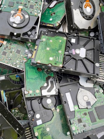 A pile of computer hard drives ready to be recycled. High quality photo