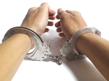 a man's hands are in handcuffs 2