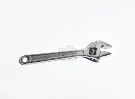 Photo for Adjustable wrench made of wrought iron on a white background - Royalty Free Image