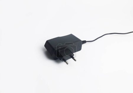 Photo for 12 volt battery charger adapter on isolated white background - Royalty Free Image