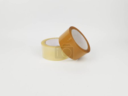 Clear and brown duct tape used for packaging goods and isolated white background