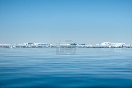 Photo for Antarctic landscape: blue waters of the Weddell sea with white ice and icebergs in a distance - Royalty Free Image