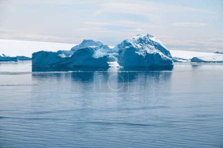 Photo for Amazing blue icebergs drifting in the Weddell Sea off the coast of Snow Hill island during the Antarctic Summer - Royalty Free Image
