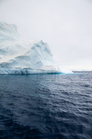 Photo for Blue iceberg melting in the Weddell Sea, Polar regions of Antarctica - Royalty Free Image